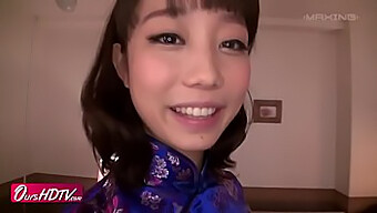 A Stunning Girl With Big Eyes In A Cheongsam Gives A Sexy Handjob