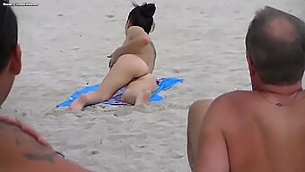 Outdoor Exhibition Of Amateur Couple On The Beach